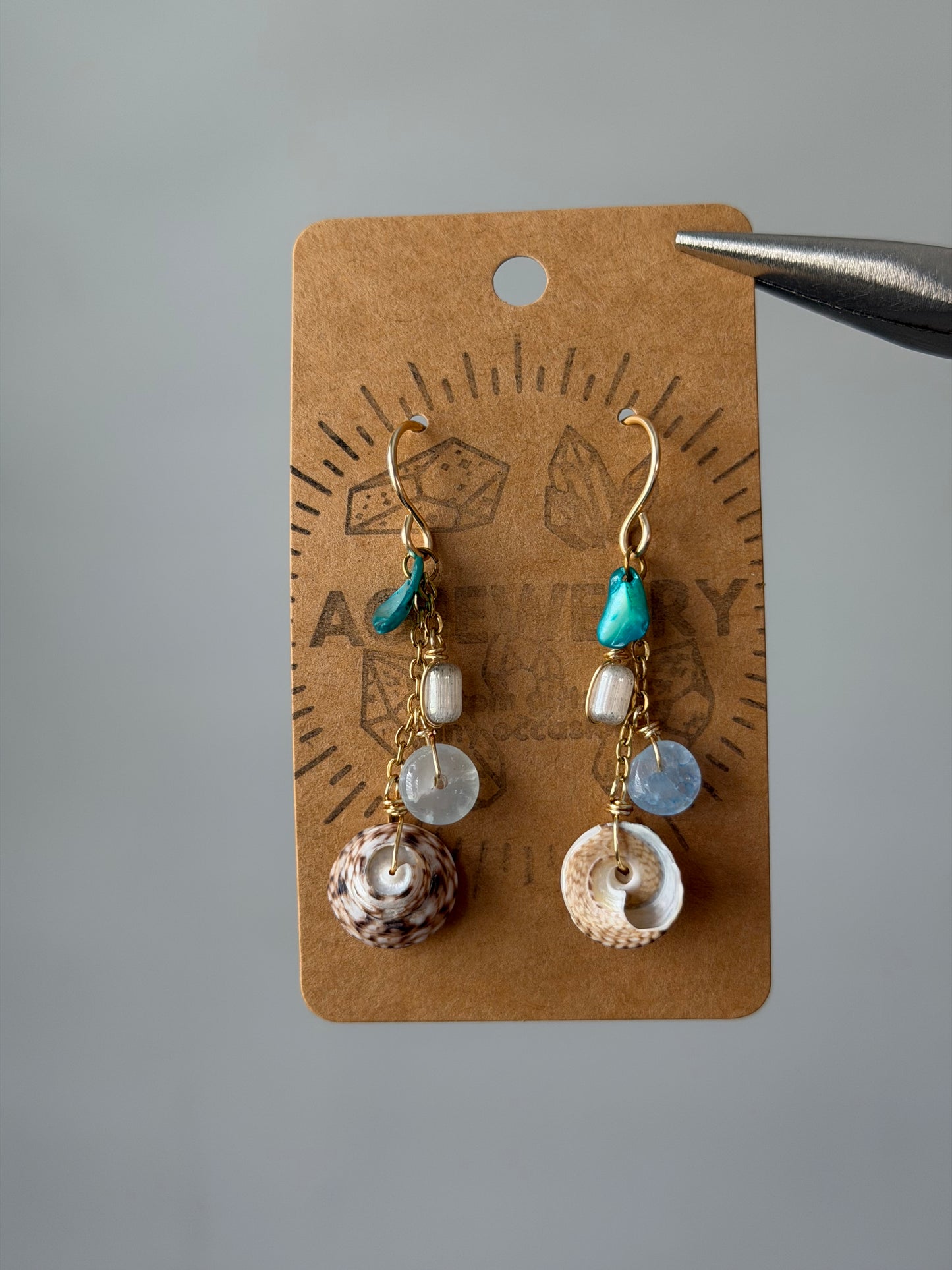 Wavy turban drop earrings