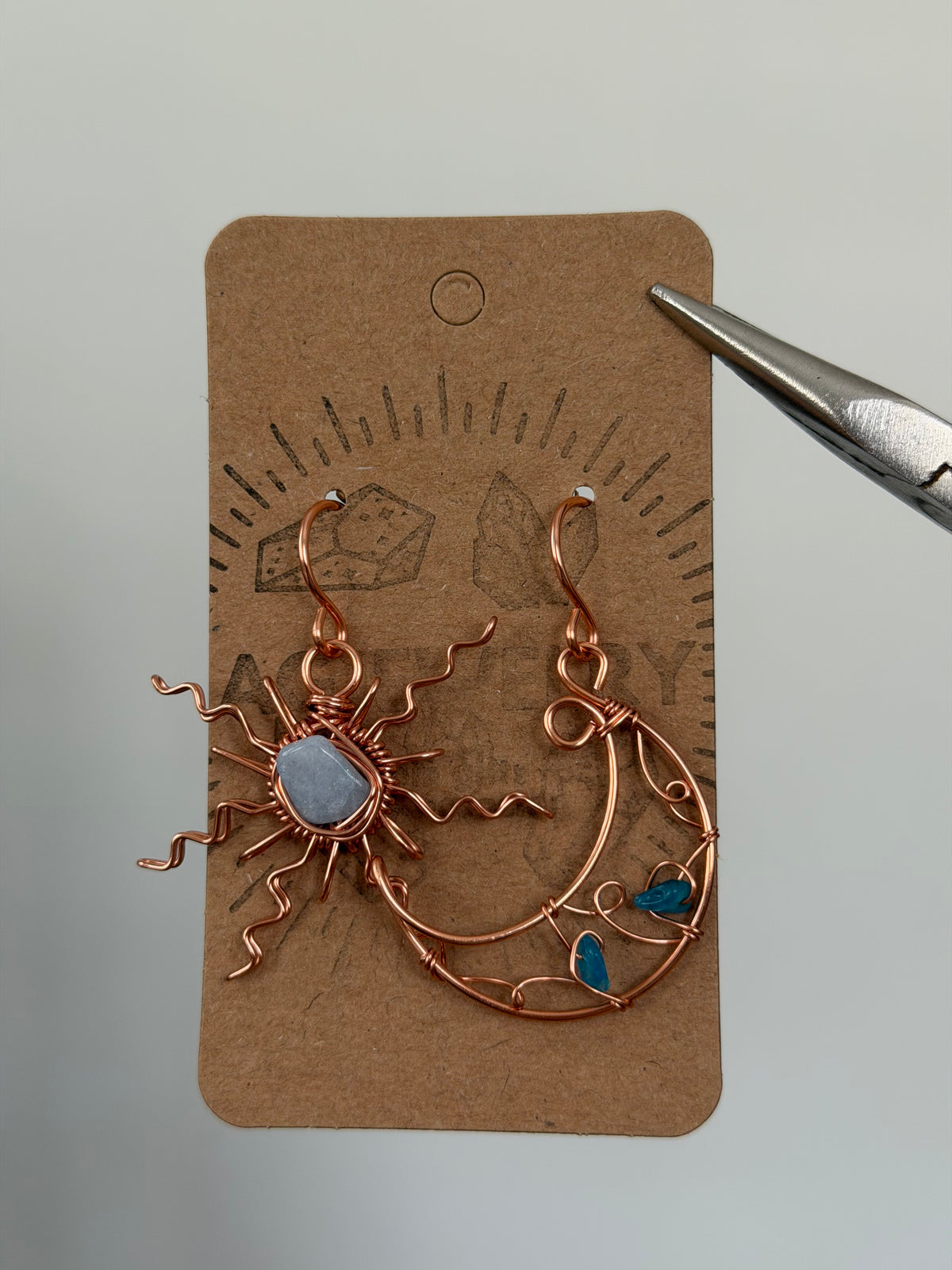Copper sun moon earrings