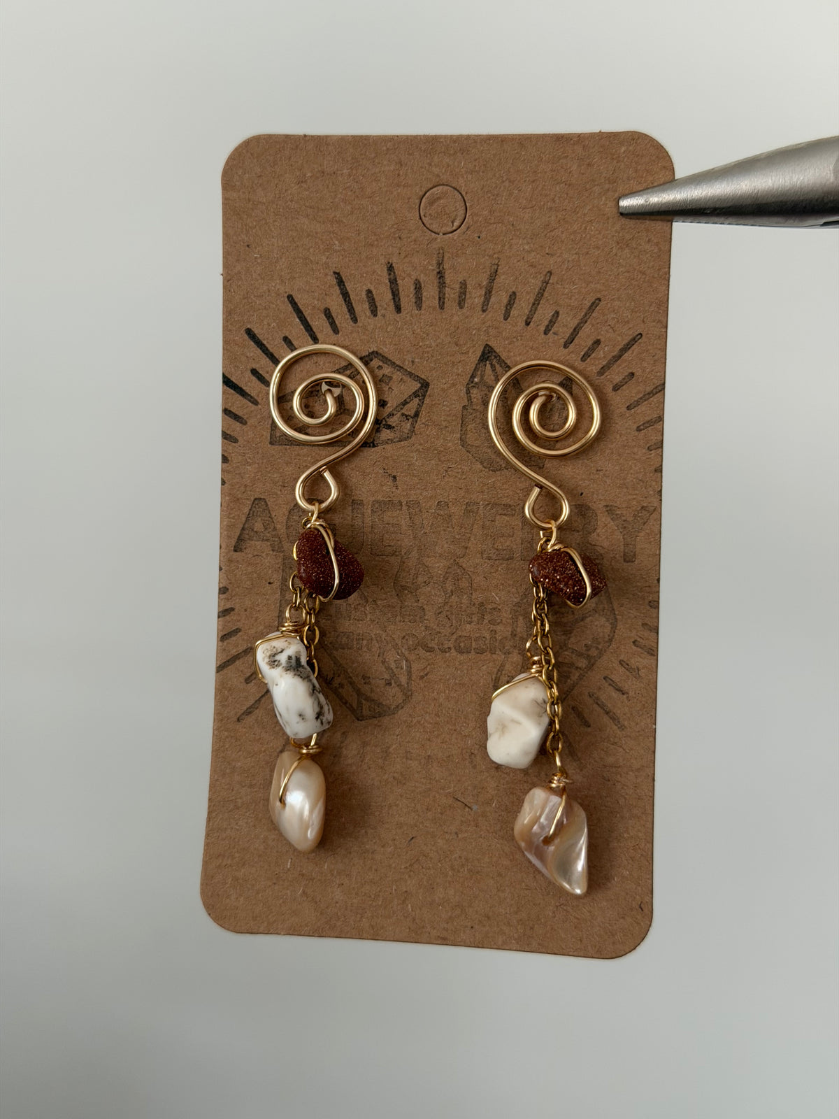 Gold stone swirl stud