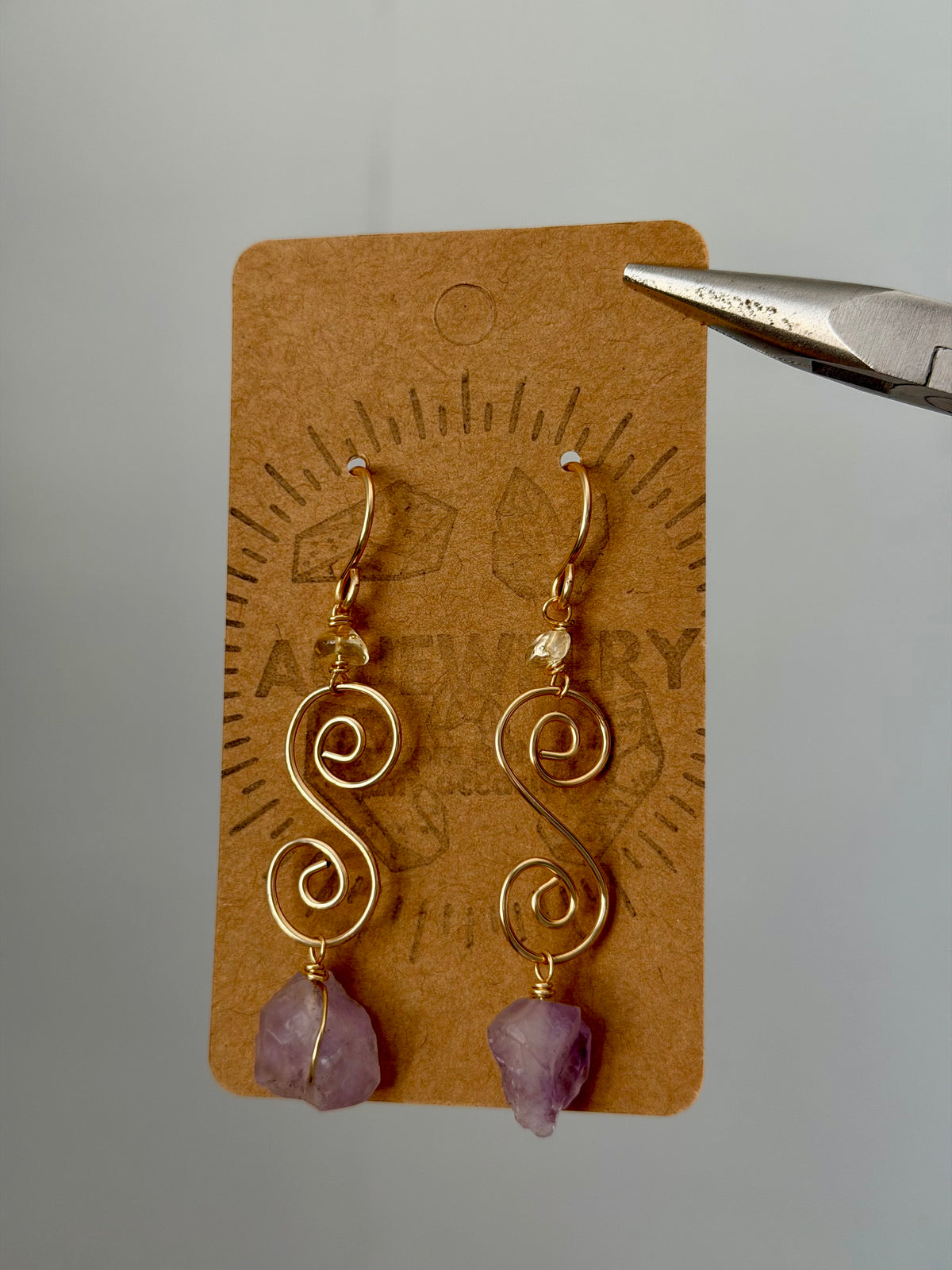 Amethyst swirl earrings
