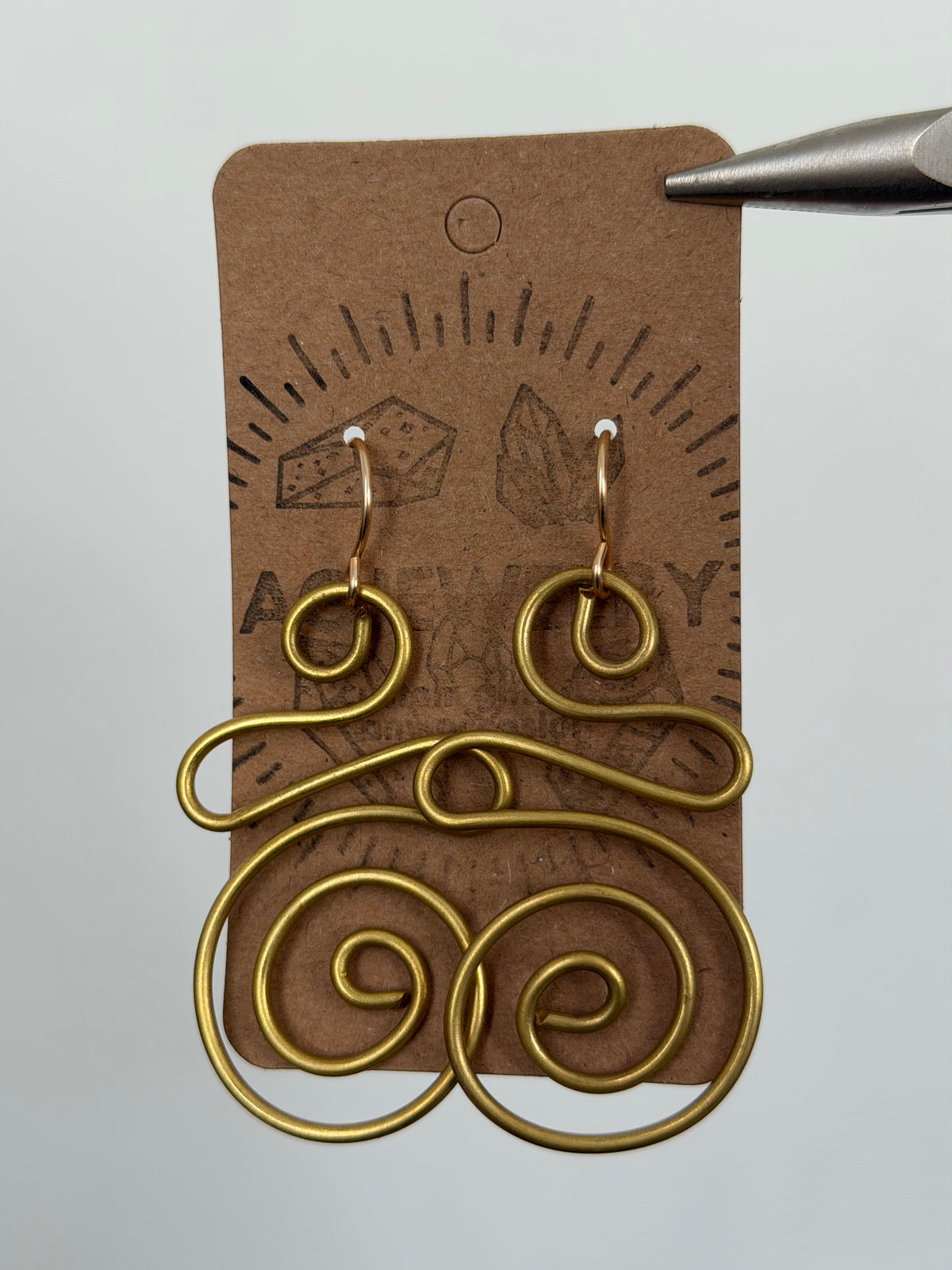 Brass swirl earrings