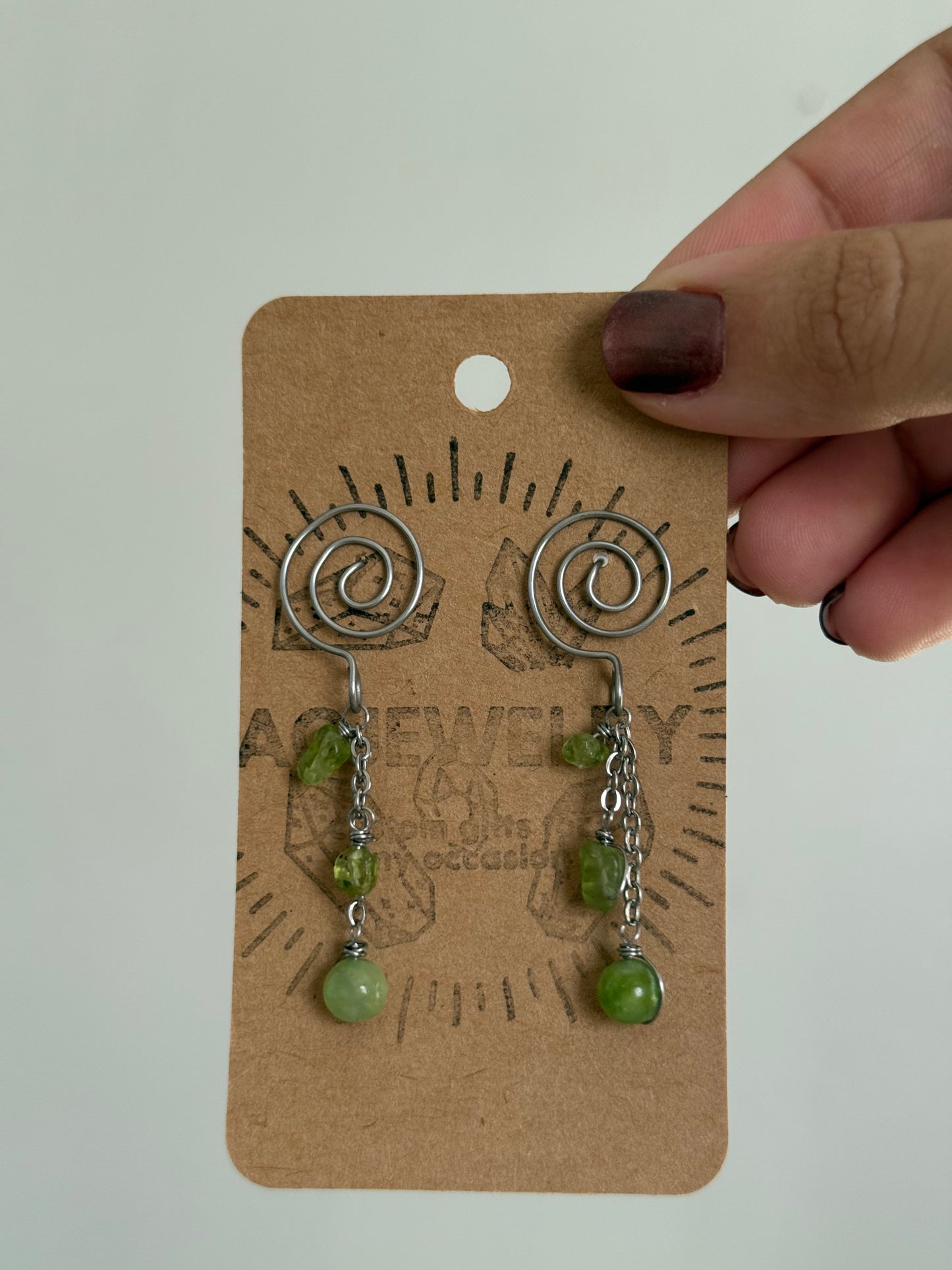 Peridot swirl studs