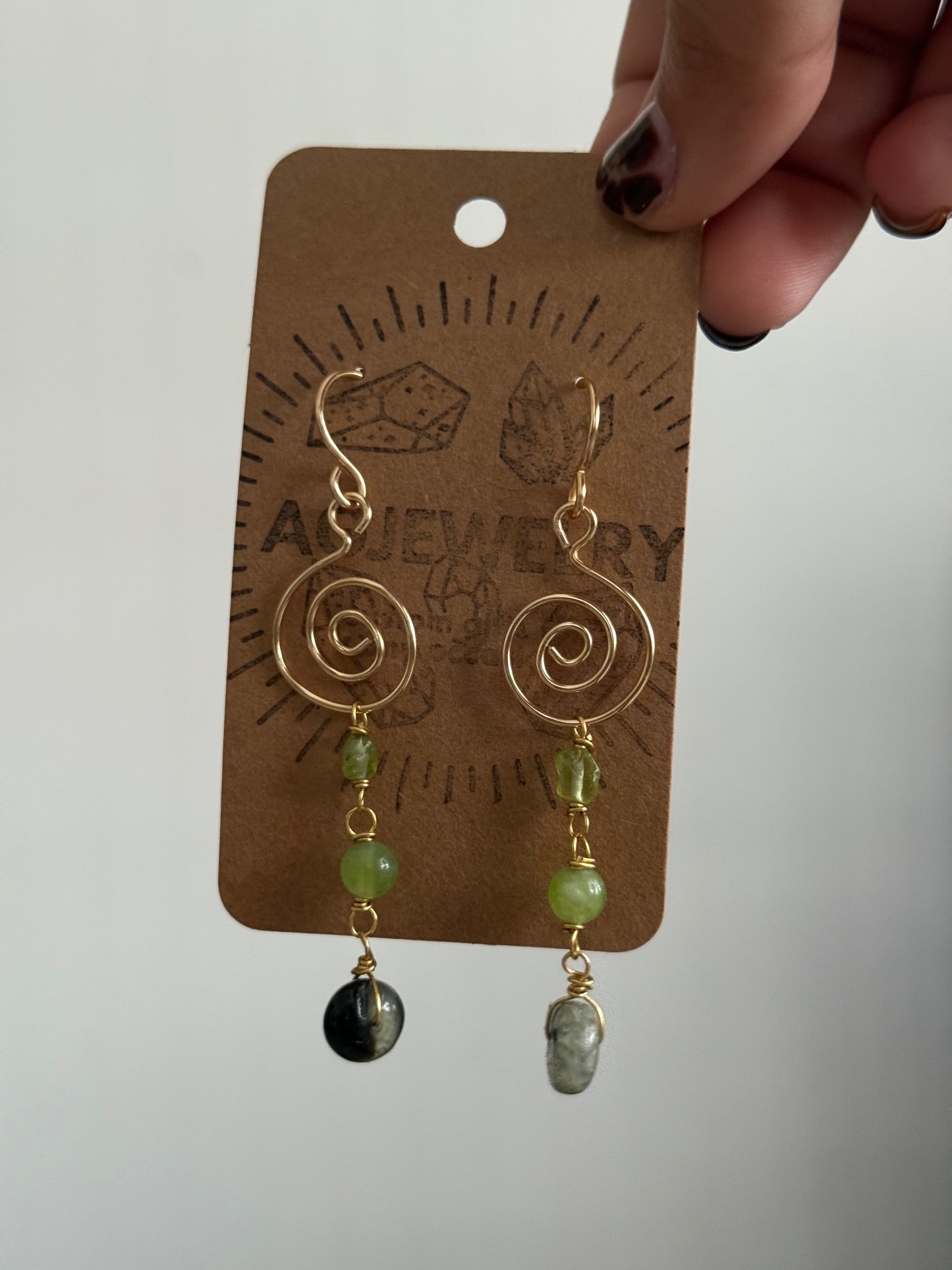 Peridot swirl earrings