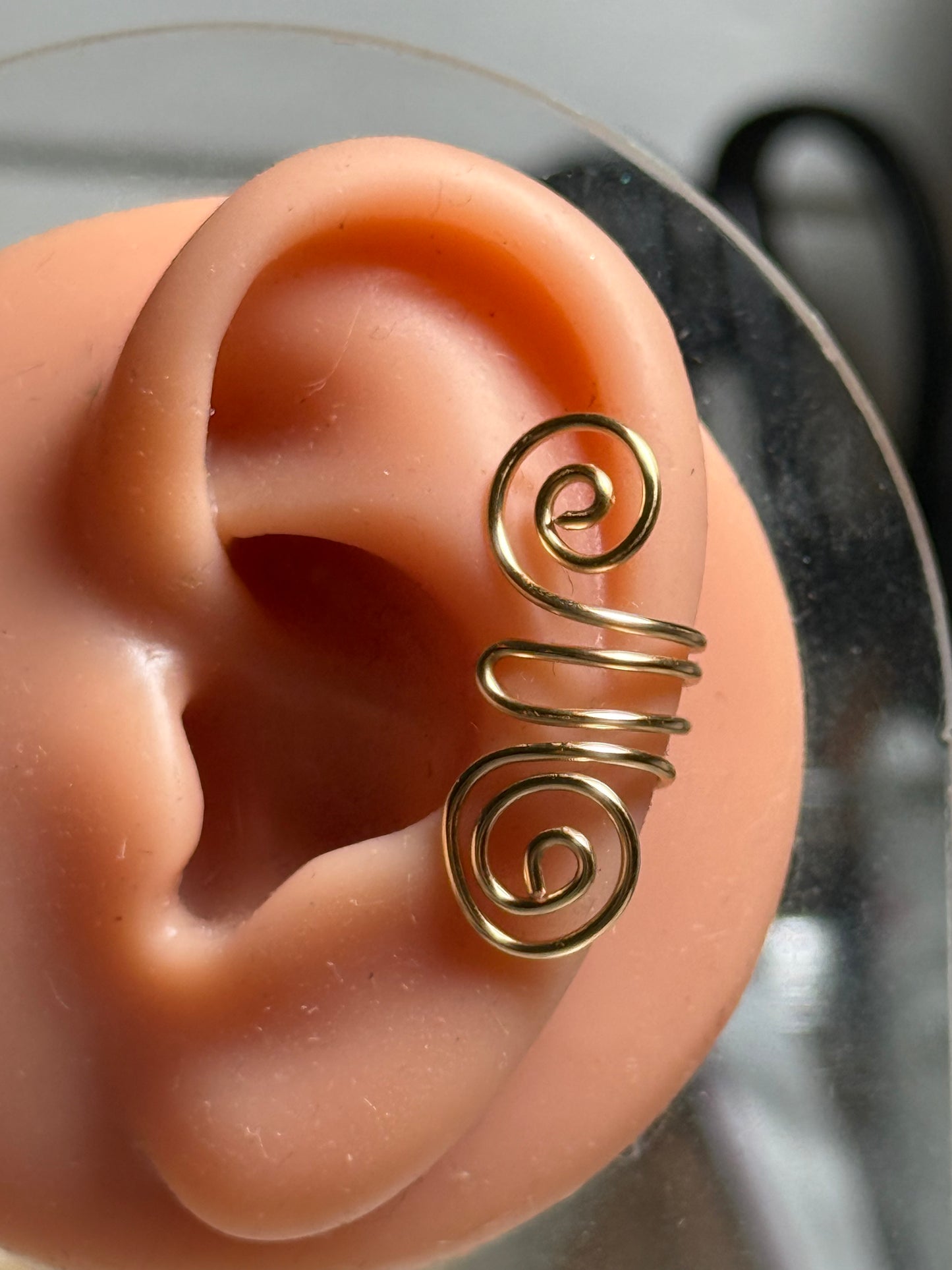 Wire abstract ear cuff